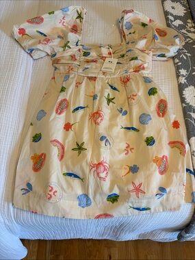 Free Assembly Cream Dress with Colorful Sea Motif